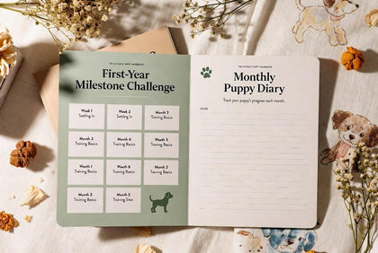 Ultimate Puppy Handbook first-year milestone challenge and monthly diary page mockup